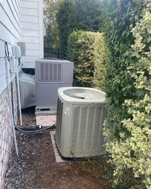 Outdoor equipment beside a house.