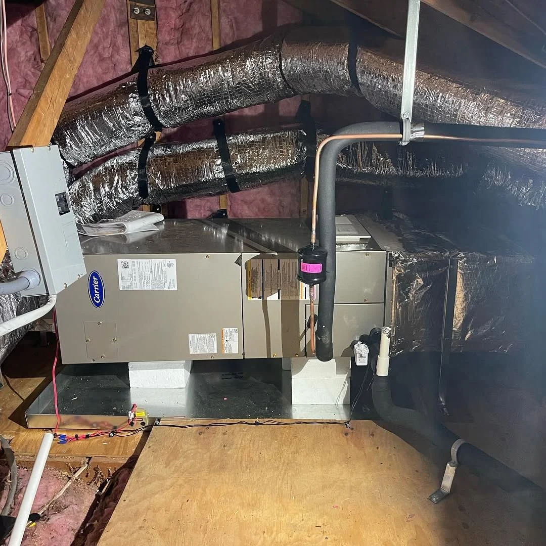 Attic HVAC equipment with duct connections; several similar angles.